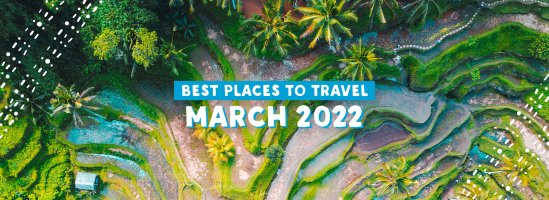 An image of the emerald green rice terraces in Bali, Indonesia with a graphic that reads Best Places to Travel in March 2022 