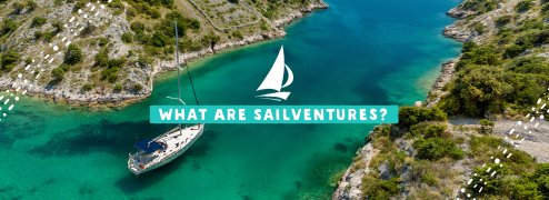  A banner of a sail boat cruising along the bright turquoise water with a text graphic that says What Are SailVentures?