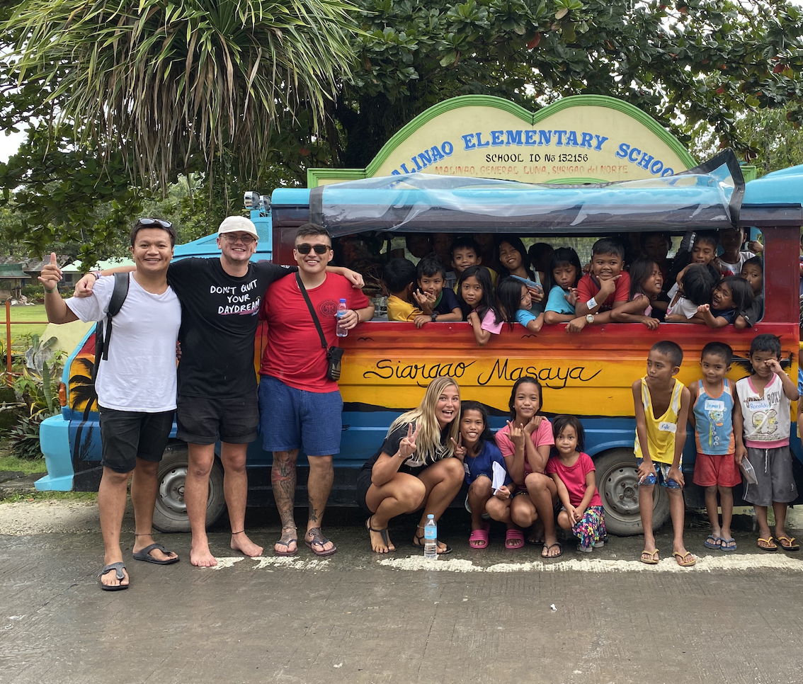 Group photo at mobile library, siargao