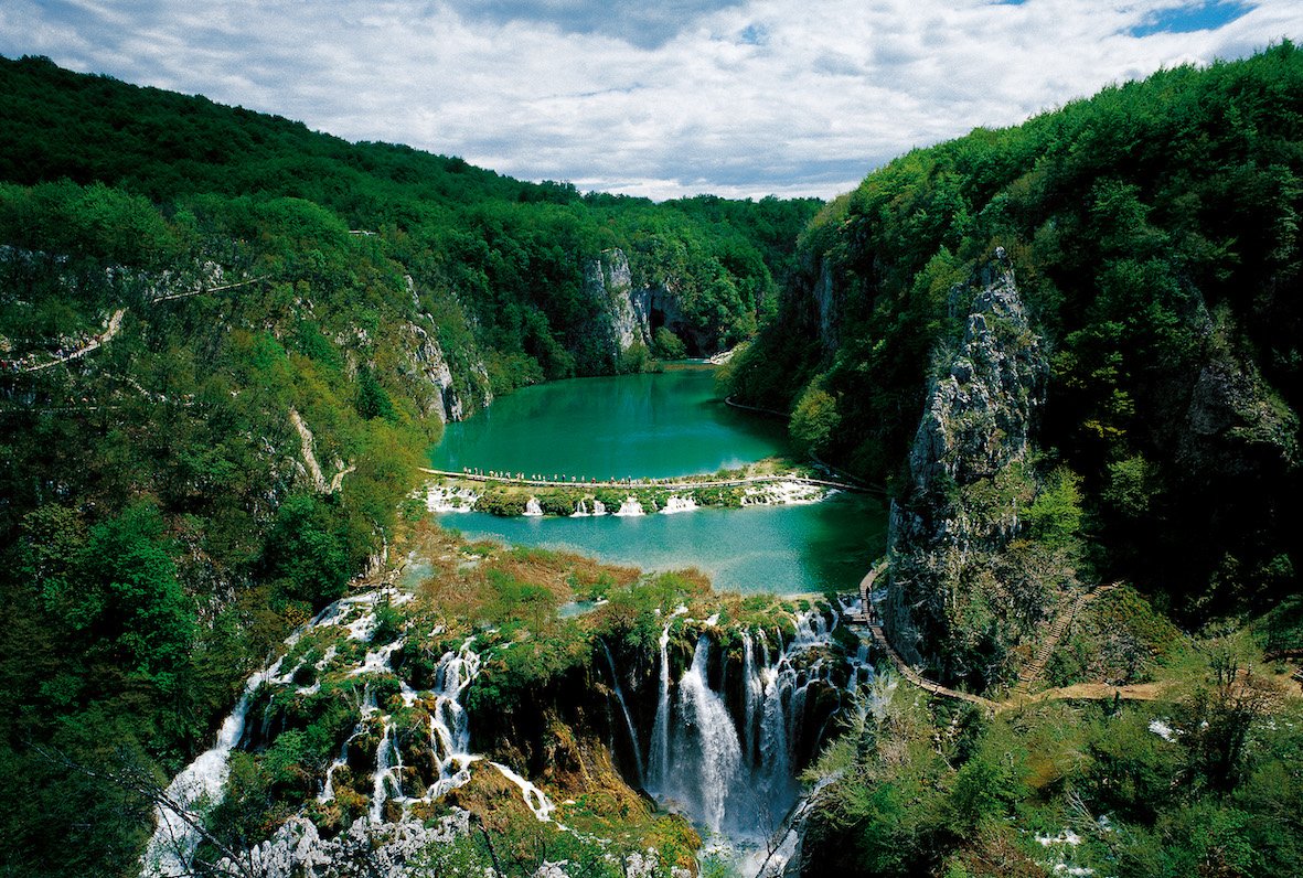 An aerial shot of the stunning waterfalls at Plitvice Lakes in Croatia 