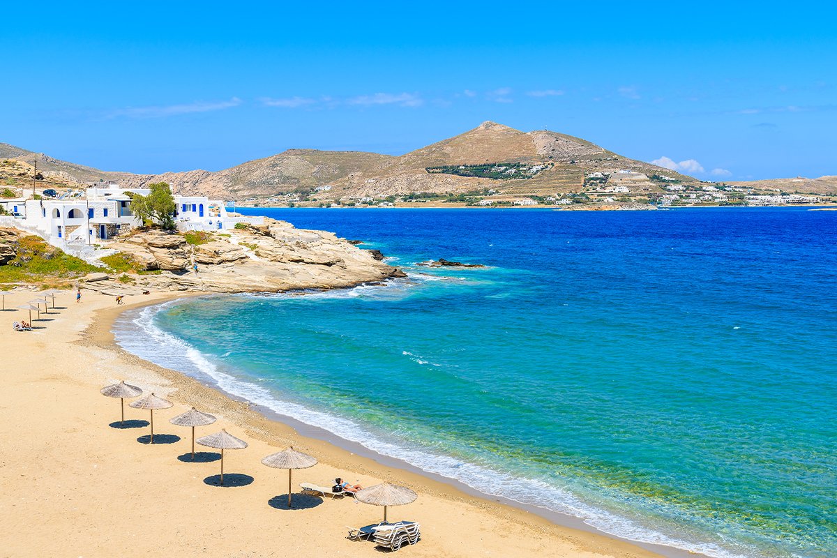 View of the bright turquoise water and secluded beach in Paros Greece