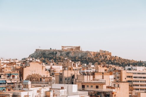 A view of Athens, Greece with the famous ancient ruins in the distance