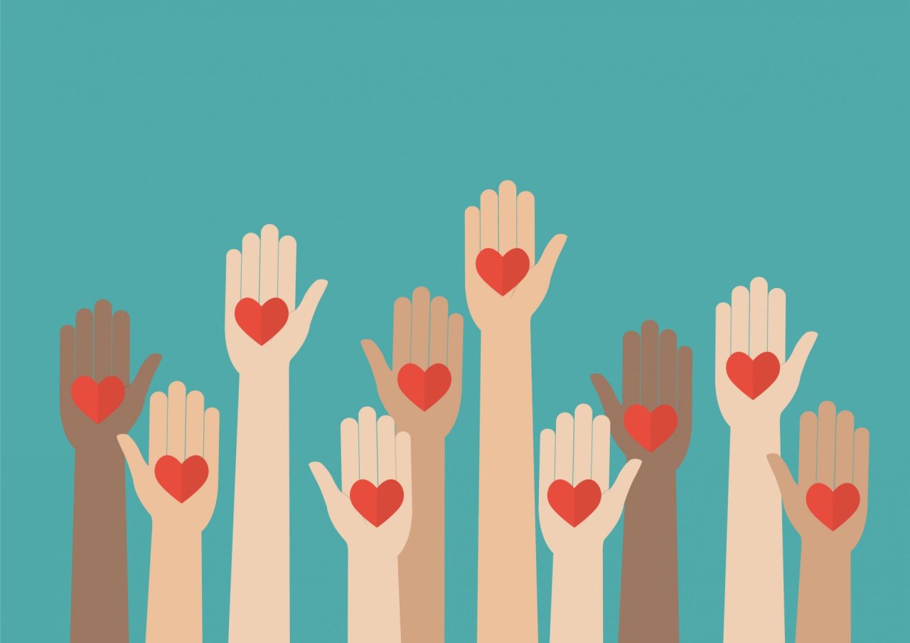 Graphic of hands with love hearts on 