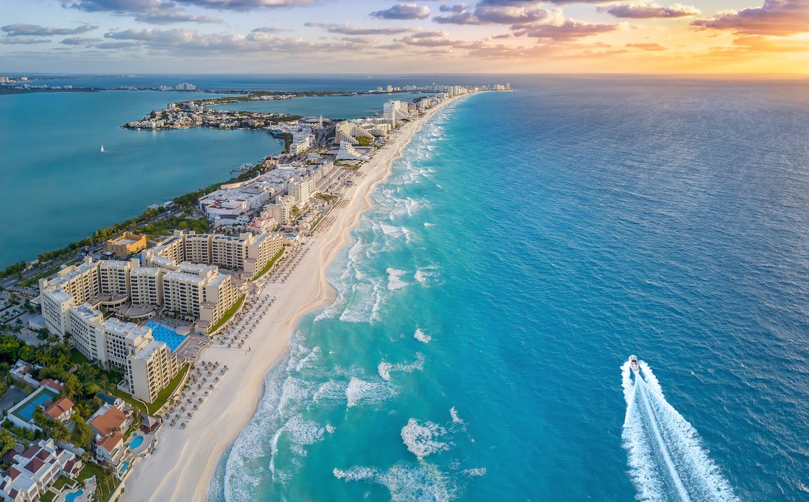 Birds eye view of cancun, Mexico - sea with tall buildings on land