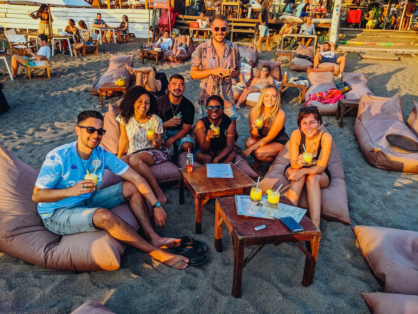 A group at the beach enjoying drinks in Canggu Bali, Indonesia 