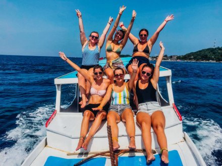 A group on a boat getting ready to snorklel in Gili Trawangan, Indonesia