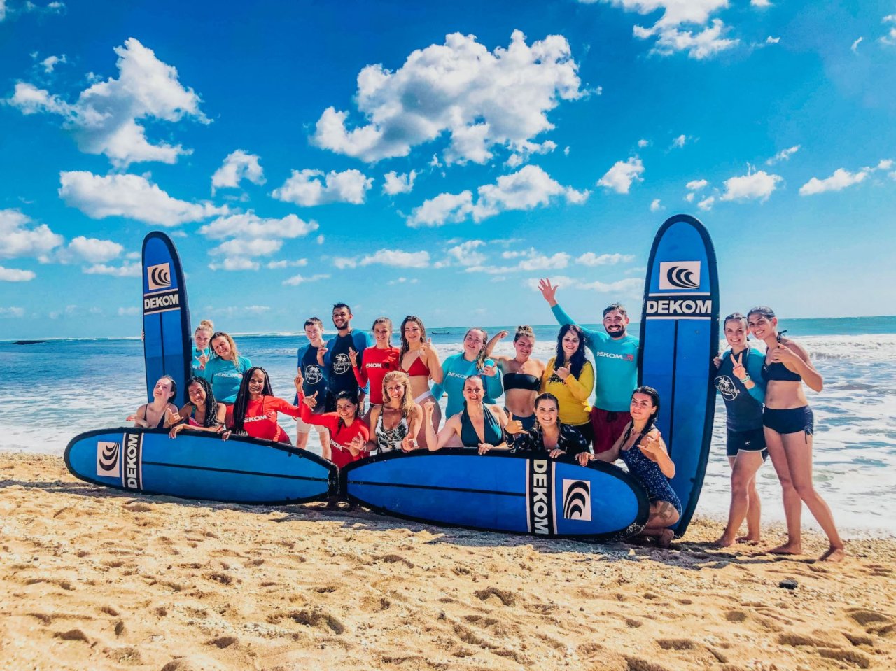 A group surfing at Kuta beach in Bali Indonesia 