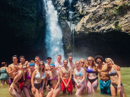 A group shot by Tegenungan waterfall in Bali Indonesia 