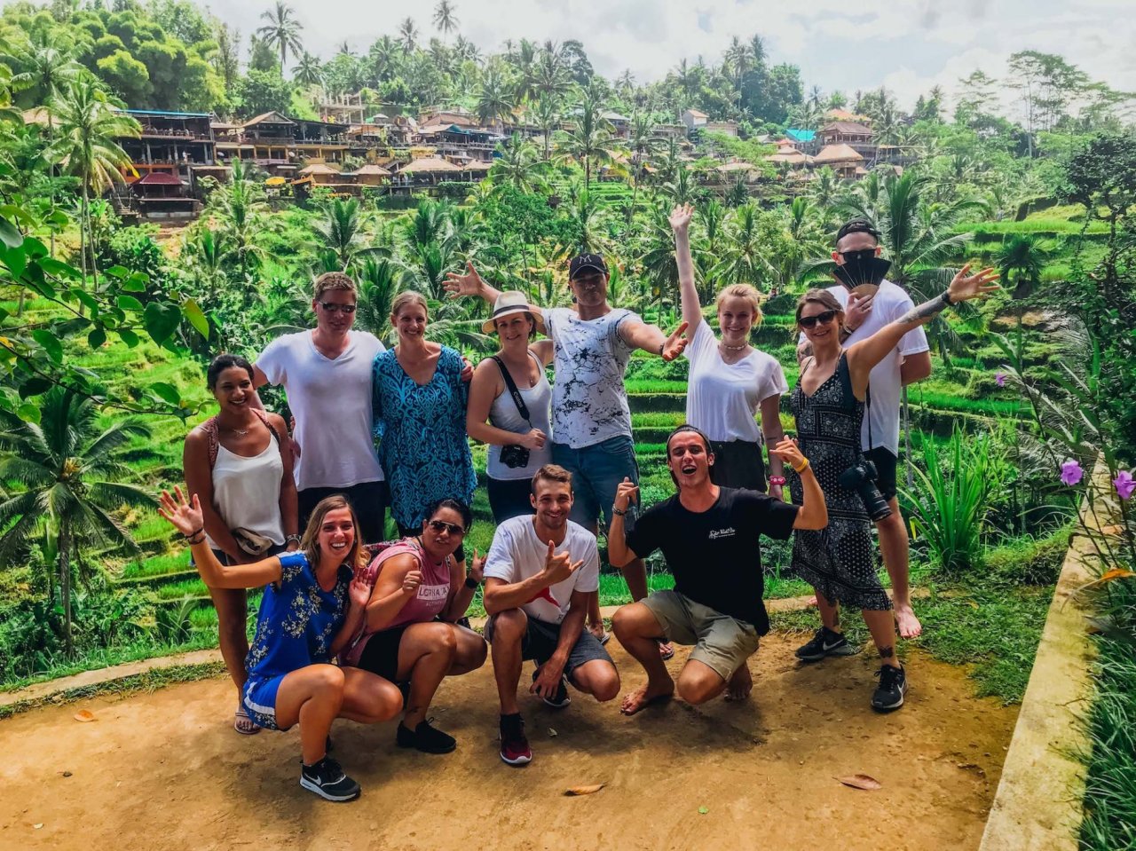 A group by the famed emerald green rice terraces in Ubud, Bali, Indonesia 