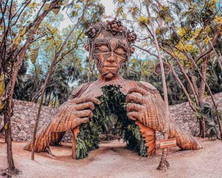 A shot of a wooden statue in Tulum, Mexico. 