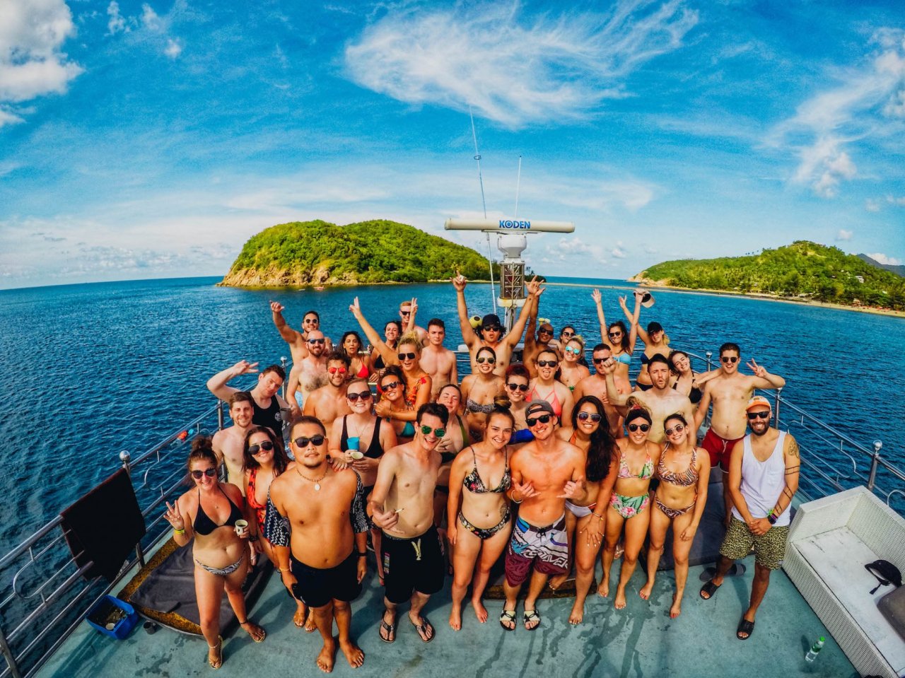 Beach party in Koh Phangan with islands in the background 