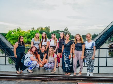 Group of girls on the bridge over River Kwai 