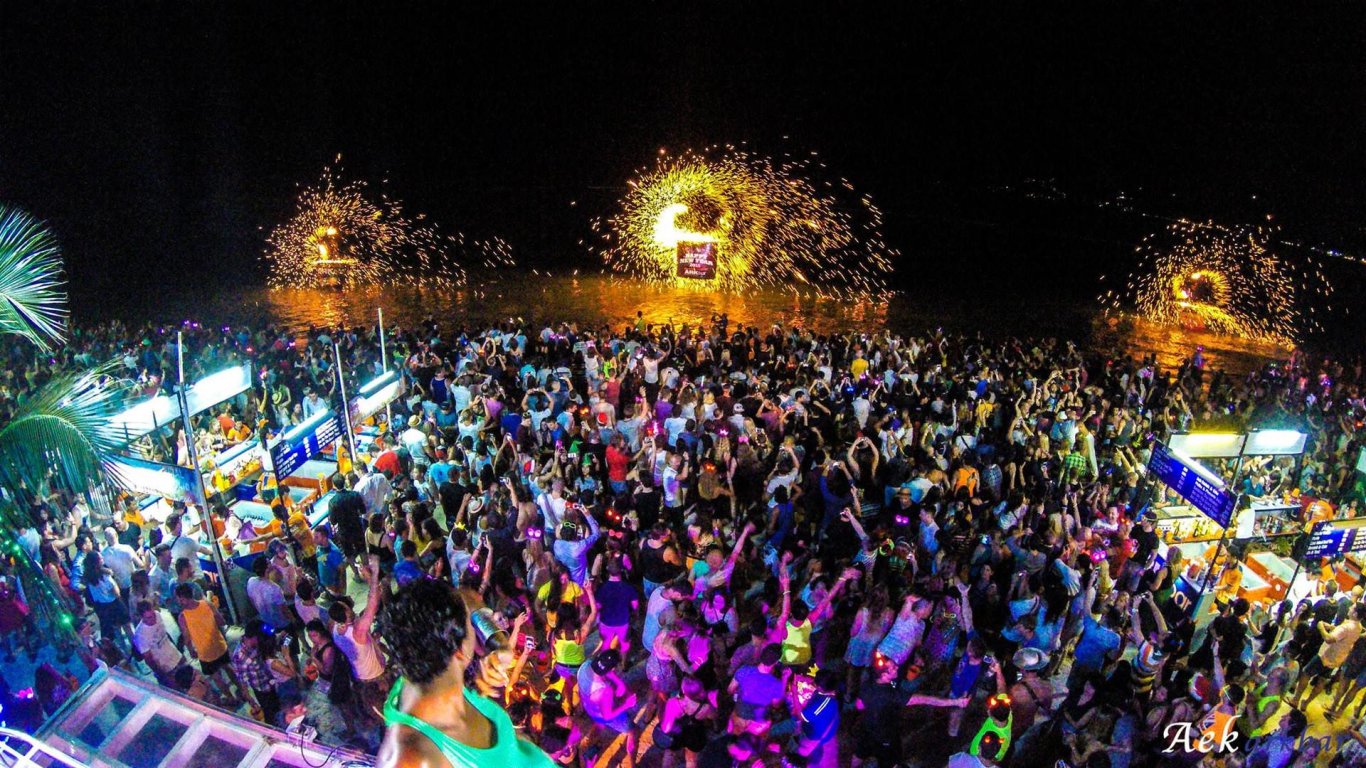 group shot at full moon party in thailand