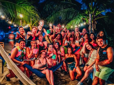 A group photo at the full moon party in Koh Phangan Thailand 