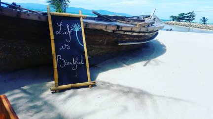 travelling in thailand sign on the beach life is beautiful