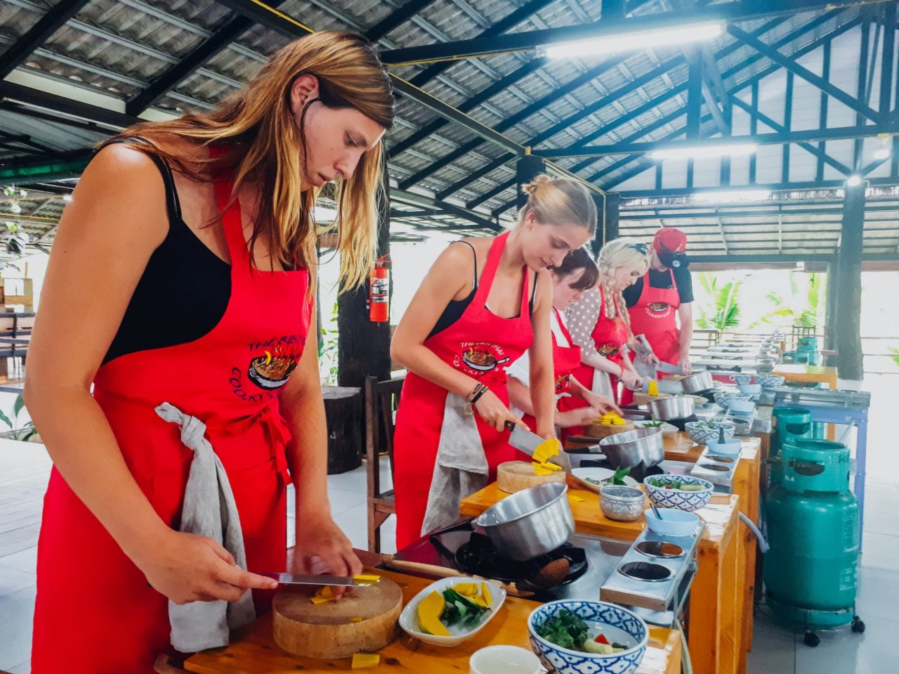 Chopping up ingredients during the cooking class in Chiang Mai Thailand 