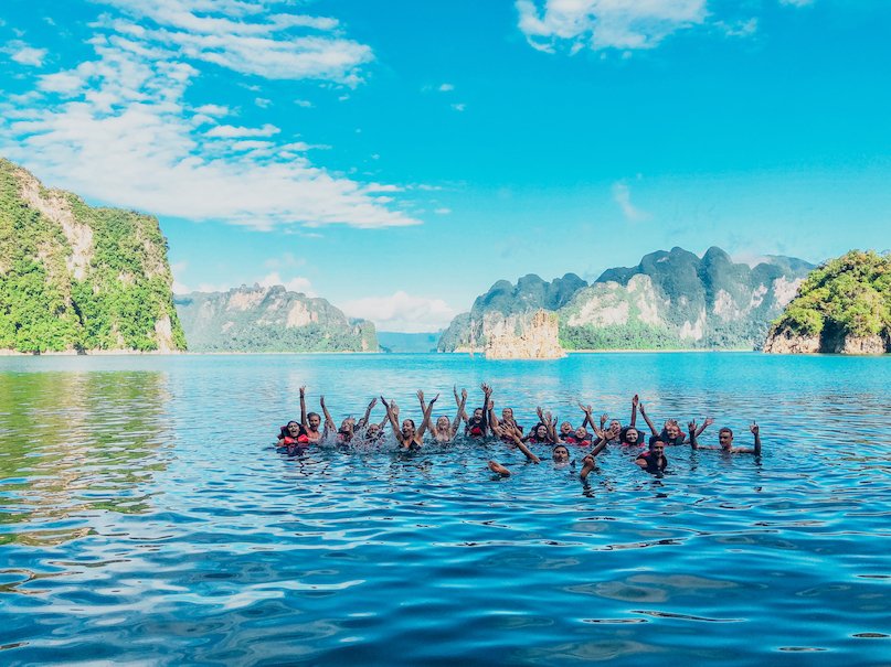 A group photo in the lake at Khao Sok national park in Thailand 
