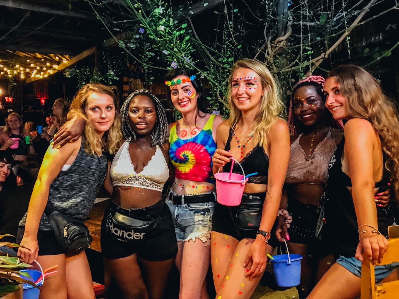 Full moon party group pictures with colourful buckets Koh Phangan Thailand 