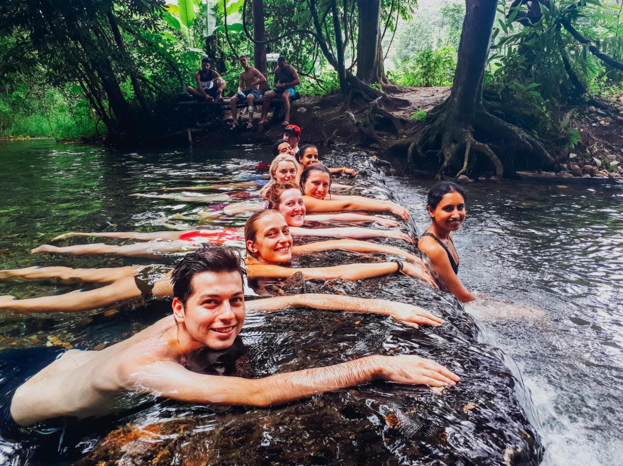 Swimming in the temple hot springs at the caves in Pai Thailand 