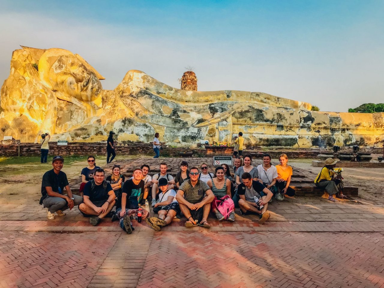 A group shot at the reclining buddha in Ayutthaya Thailand