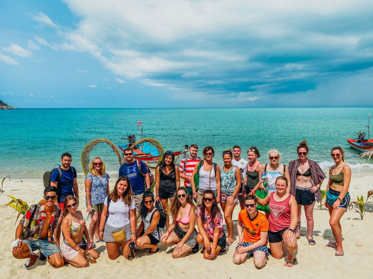 A group photo with crystal clear waters at bottle beach Koh Phangan Thailand