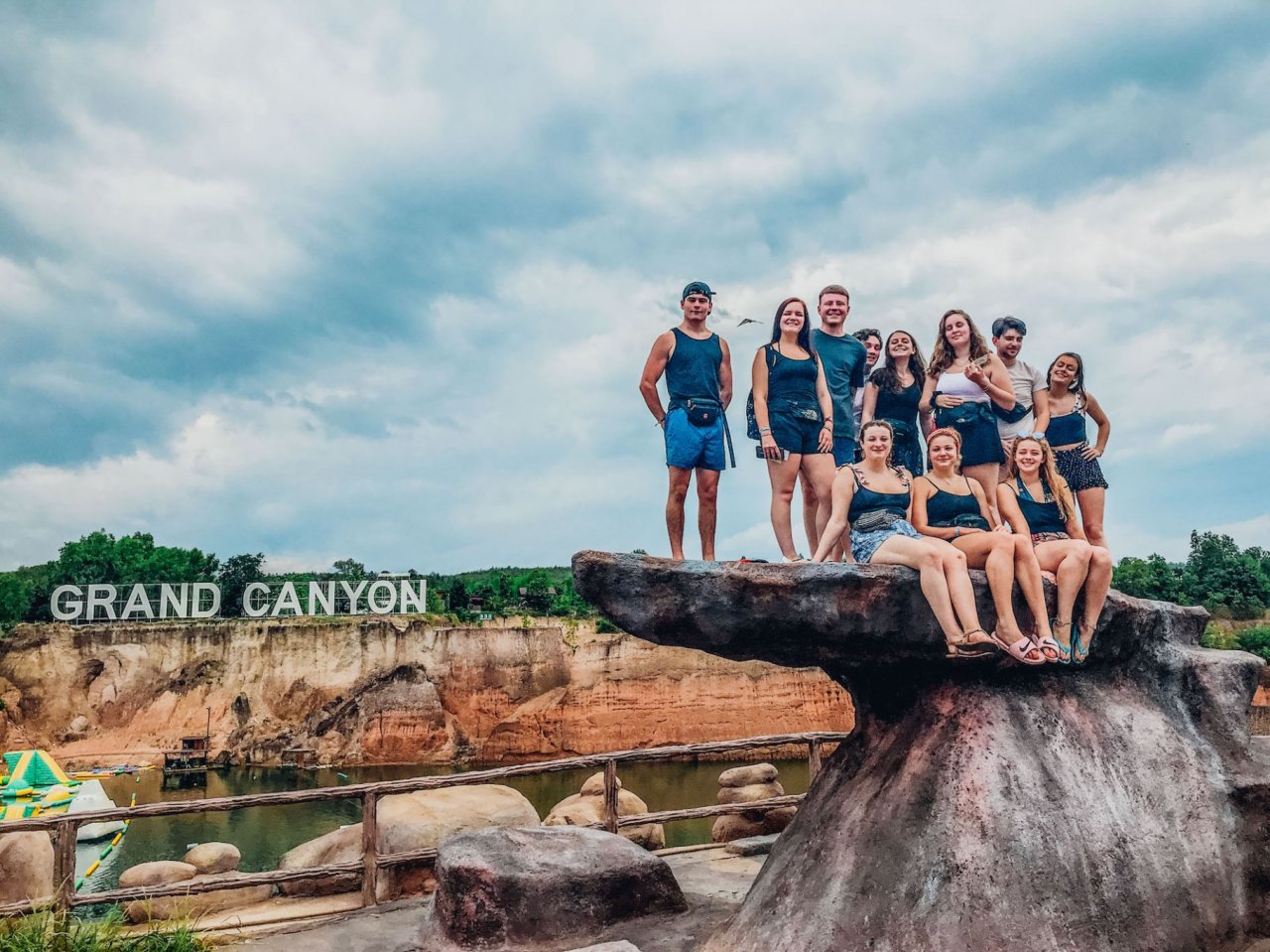 A scenic group picture on a boulder at Grand Canyon 