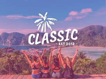 Classic EST. 2012 text on a background of four girls at the edge of a viewpoint overlooking two gorgeous bays in Koh Phi Phi Thailand 